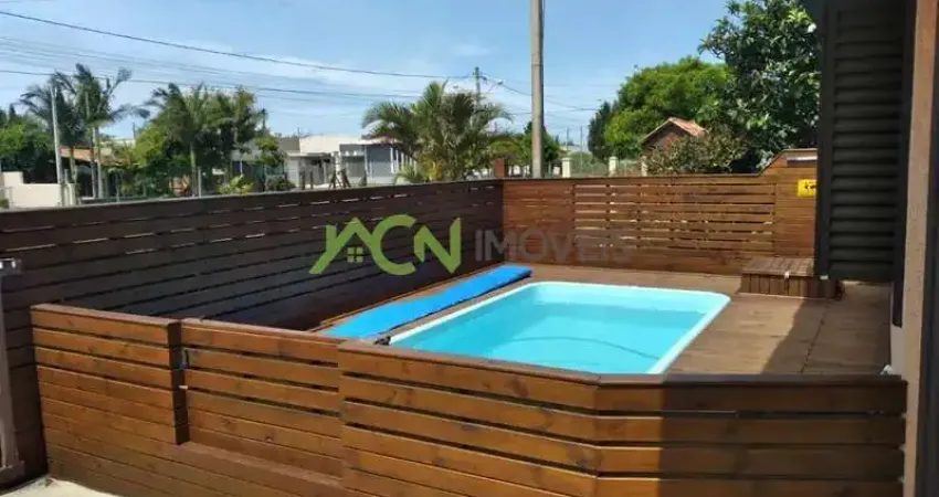 casa com dois dormitórios sendo um suite em Nova Tramandai!!!!
