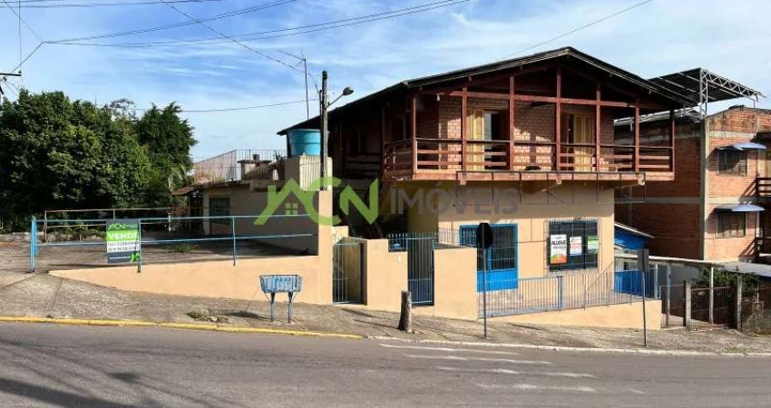 Prédio comercial de esquina com sala/loja térrea, casa no pavimento superior e chalé. Esquina com Av. Presidente Lucena, bairro União, Estância Velha