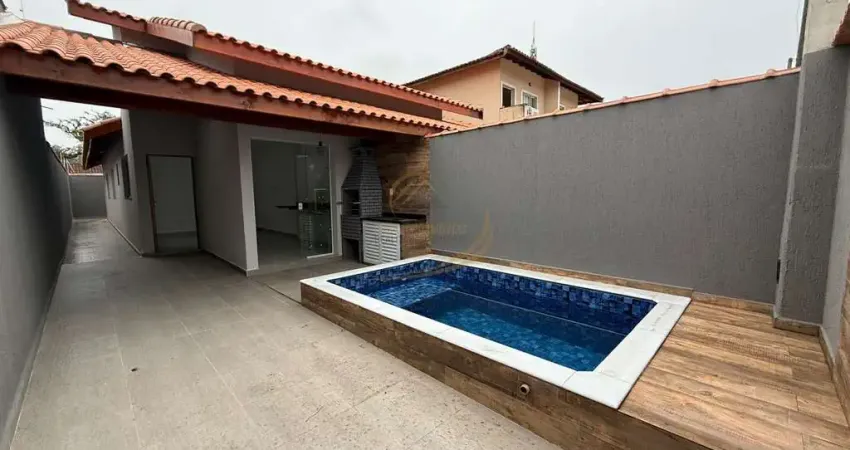 Casa geminada lado pista 600 mts do mar com piscina e churrasqueira em itanhaém!!
