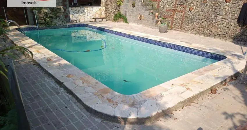 Sobrado com 5 dormitórios à venda, 530 m² por R$ 1.200.000,00 - Guaiuba - Guarujá/SP