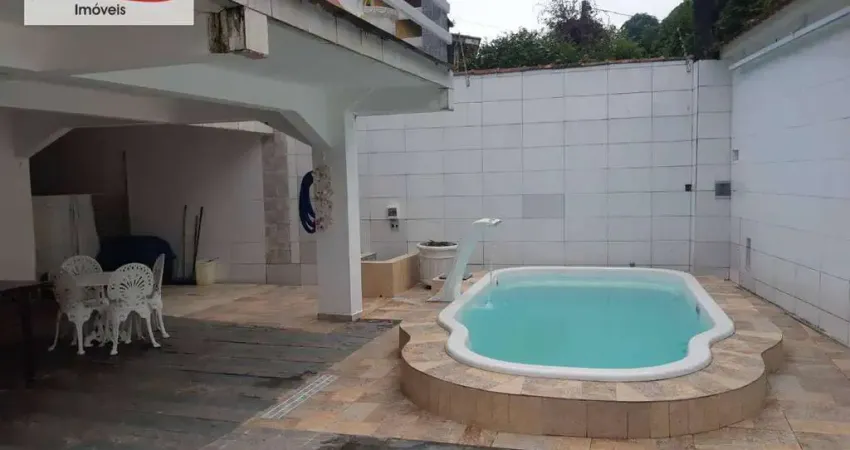 Sobrado com 4 dormitórios à venda, 310 m² por R$ 1.600.000 - Guaiuba - Guarujá/SP