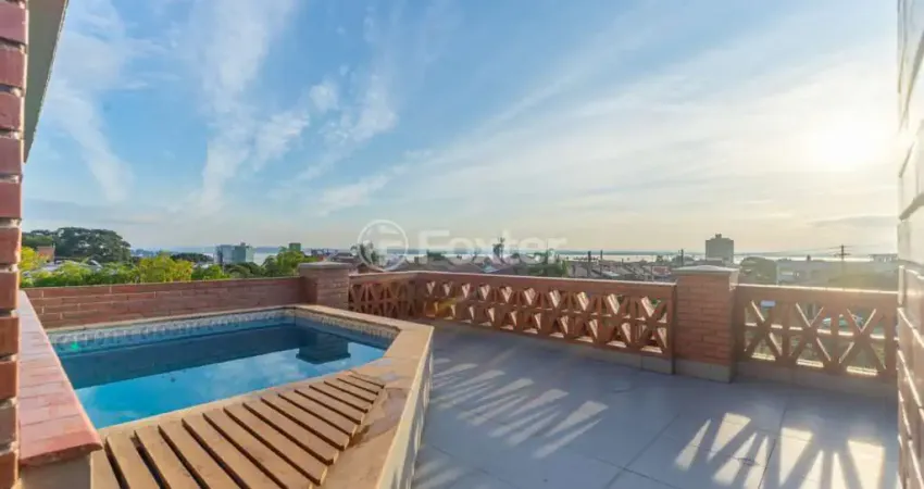 Casa em condomínio fechado com 4 quartos à venda na Avenida Jacuí, 978, Cristal, Porto Alegre