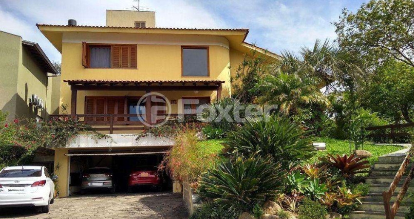 Casa em condomínio fechado com 3 quartos à venda na Rua Adriano Pereira da Silva, 311, Vila Nova, Porto Alegre