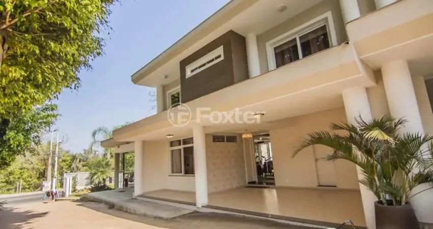 Casa em condomínio fechado com 3 quartos à venda na Avenida Coronel Marcos, 1460, Pedra Redonda, Porto Alegre
