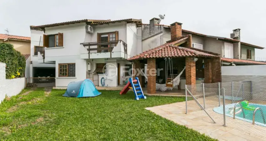 Casa com 5 quartos à venda na Rua Fortunato Della Casa, 35, Espírito Santo, Porto Alegre