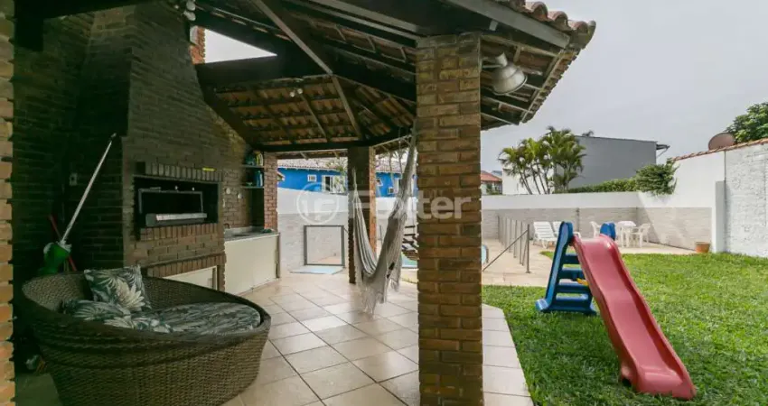 Casa com 5 quartos à venda na Rua Fortunato Della Casa, 35, Espírito Santo, Porto Alegre