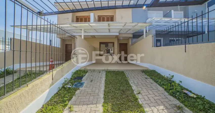Casa com 3 quartos à venda na Rua Heitor Kramer, 644, Guarujá, Porto Alegre