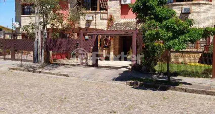 Casa com 3 quartos à venda na Rua Jacundá, 633, Guarujá, Porto Alegre