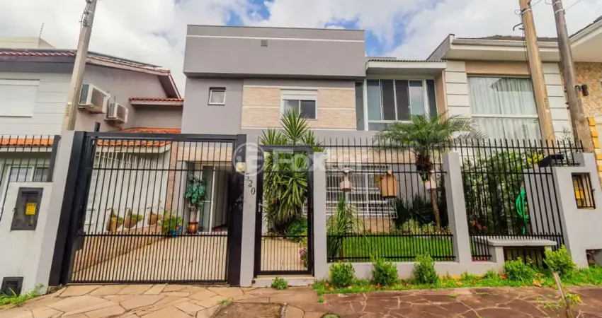 Casa em condomínio fechado com 3 quartos à venda na Rua Ronaldo Molina de Quadros, 320, Mário Quintana, Porto Alegre