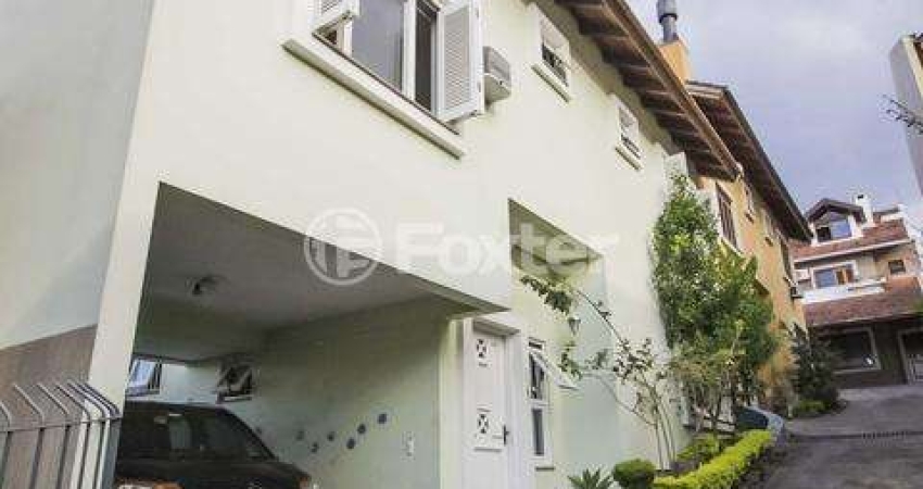 Casa em condomínio fechado com 3 quartos à venda na Rua Padre João Batista Reus, 2083, Vila Conceição, Porto Alegre