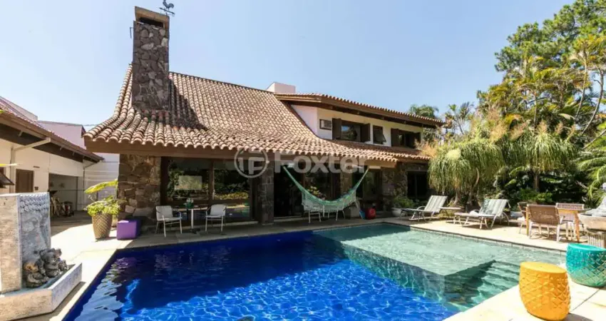 Casa com 5 quartos à venda na Rua Potiguara, 174, Vila Assunção, Porto Alegre