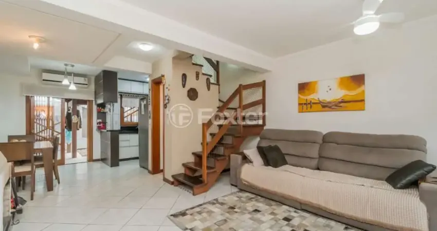 Casa em condomínio fechado com 3 quartos à venda na Avenida Edgar Pires de Castro, 1286, Hípica, Porto Alegre