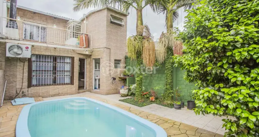 Casa com 4 quartos à venda na Rua Evangelina Porto, 140, Vila João Pessoa, Porto Alegre