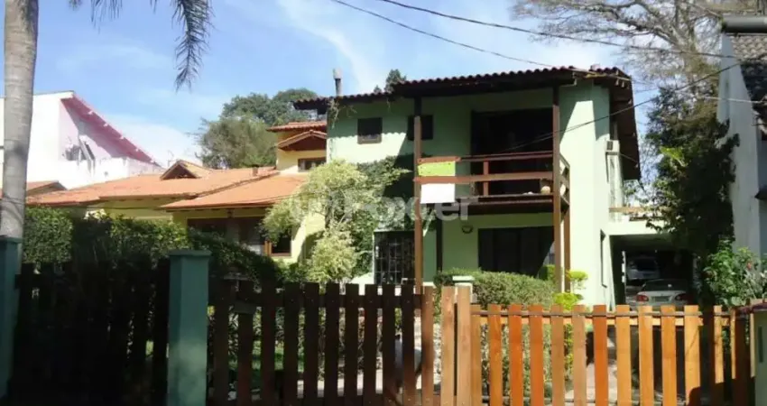 Casa em condomínio fechado com 3 quartos à venda na Rua Timbaúva, 215, São Lucas, Viamão