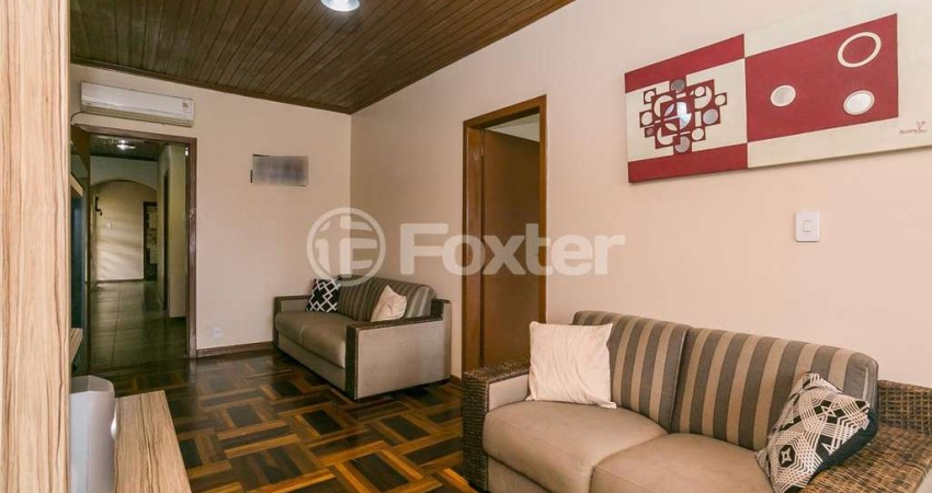 Casa com 3 quartos à venda na Rua Adroaldo Novo Correa, 195, Cavalhada, Porto Alegre