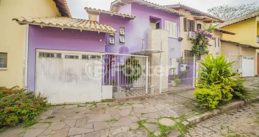Casa com 2 quartos à venda na Rua Panambi, 197, Cavalhada, Porto Alegre