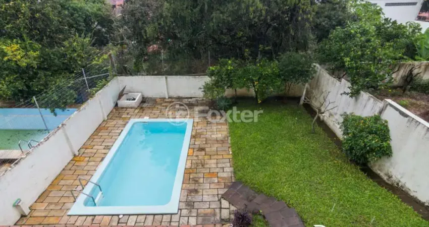 Casa com 3 quartos à venda na Rua Cariri, 400, Vila Assunção, Porto Alegre