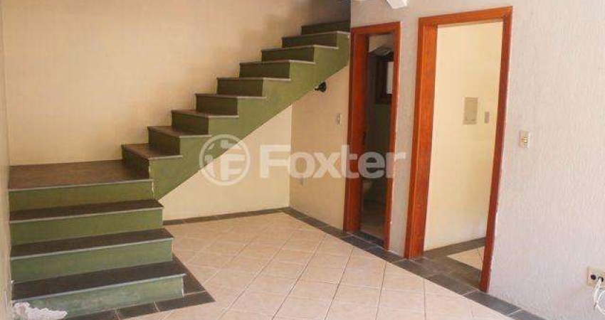 Casa em condomínio fechado com 3 quartos à venda na Rua Padre João Batista Reus, 2475, Camaquã, Porto Alegre
