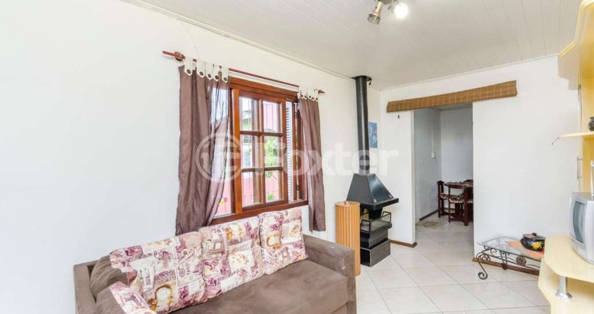 Casa comercial com 3 salas à venda na Avenida João Ferreira Jardim, 711, Parque Santa Fé, Porto Alegre