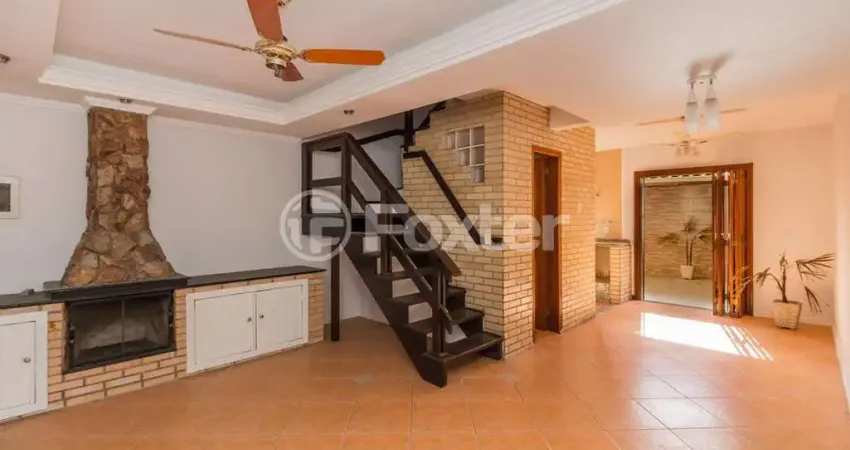 Casa em condomínio fechado com 3 quartos à venda na Avenida Edgar Pires de Castro, 1286, Hípica, Porto Alegre
