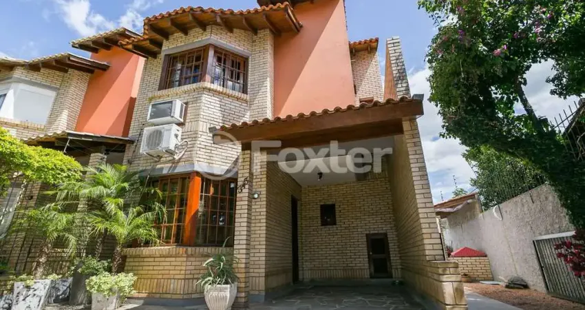 Casa com 3 quartos à venda na Rua Criciúma, 345, Guarujá, Porto Alegre