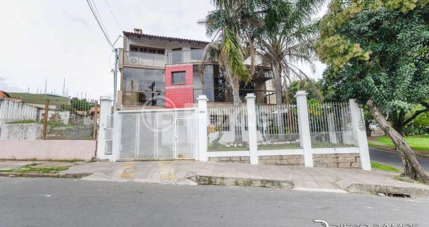 Casa com 3 quartos à venda na Avenida Luiz Moschetti, 425, Vila João Pessoa, Porto Alegre