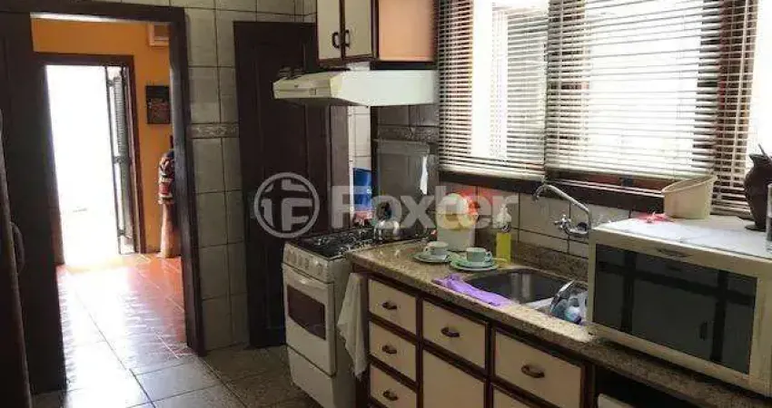 Casa com 5 quartos à venda na Rua Coronel Jaime da Costa Pereira, 318, Partenon, Porto Alegre