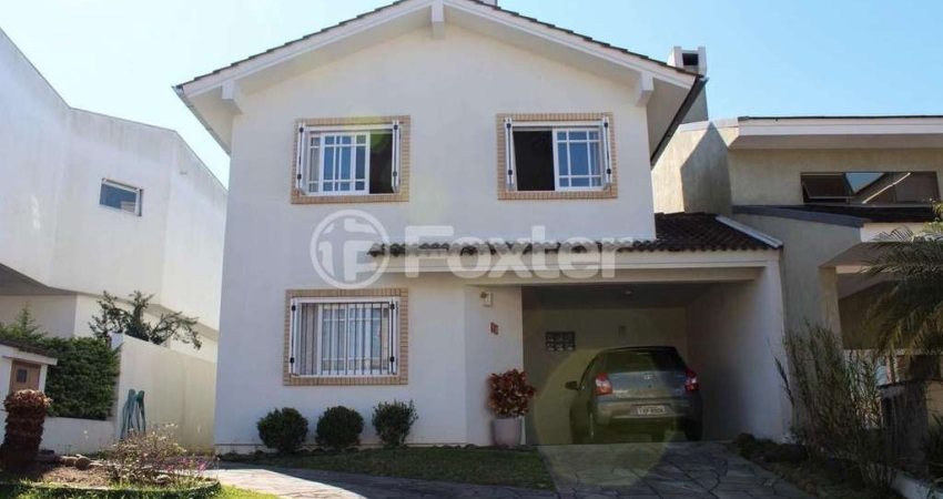 Casa em condomínio fechado com 3 quartos à venda na Avenida Edgar Pires de Castro, 540, Hípica, Porto Alegre