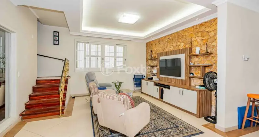 Casa com 3 quartos à venda na Rua Artigas, 191, Petrópolis, Porto Alegre