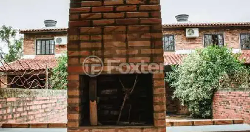Casa com 2 quartos à venda na Rua Cancio Gomes, 599, Morada Gaúcha, Gravataí