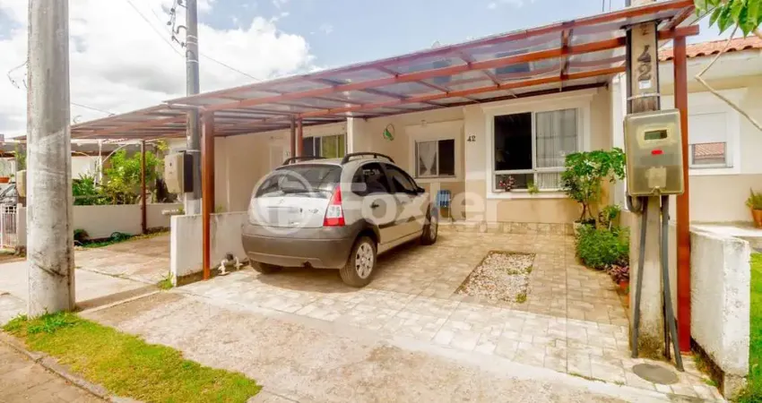 Casa em condomínio fechado com 2 quartos à venda na Estrada Costa Gama, 5124, Hípica, Porto Alegre