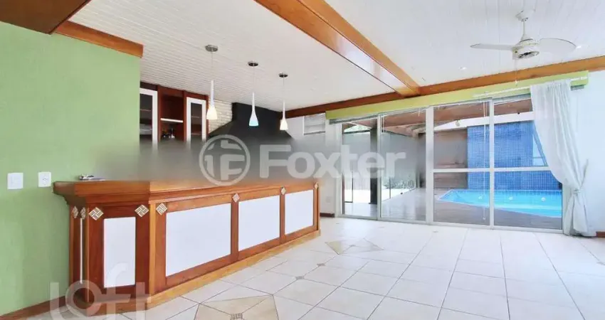 Casa com 5 quartos à venda na Rua Indianápolis, 240, Três Figueiras, Porto Alegre
