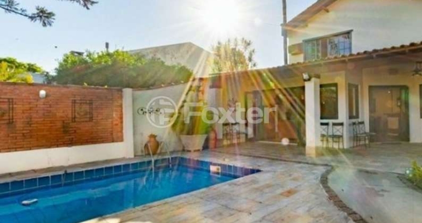 Casa com 4 quartos à venda na Rua Morano Calabro, 76, Jardim Isabel, Porto Alegre