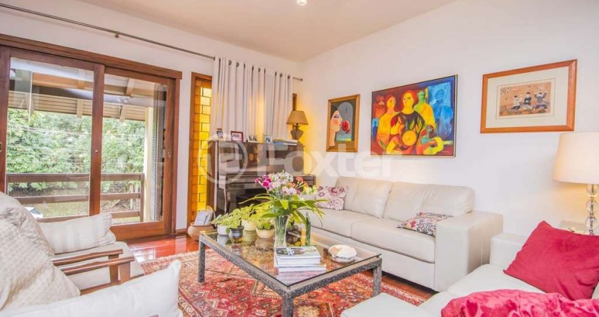 Casa com 4 quartos à venda na Rua Desembargador Hugo Candal, 140, Três Figueiras, Porto Alegre
