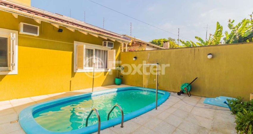 Casa com 4 quartos à venda na Avenida Mário Meneghetti, 694, Morro Santana, Porto Alegre