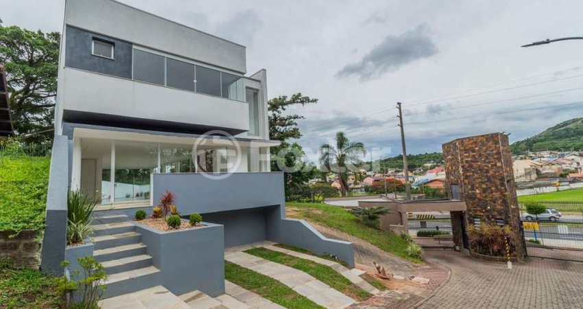 Casa em condomínio fechado com 3 quartos à venda na Avenida Juca Batista, 2705, Hípica, Porto Alegre