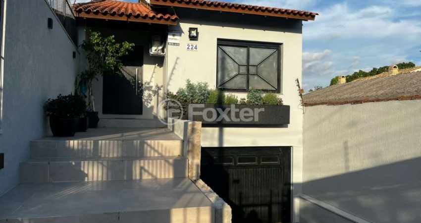 Casa com 4 quartos à venda na Rua Victor Silva, 224, Camaquã, Porto Alegre
