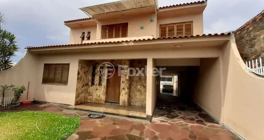 Casa com 3 quartos à venda na Rua Princesa Isabel, 735, Sumaré, Alvorada