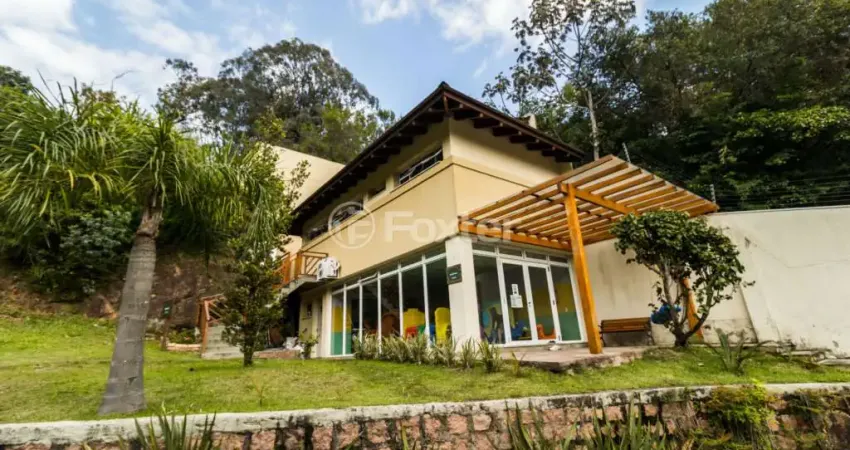 Casa em condomínio fechado com 4 quartos à venda na Avenida Engenheiro Ludolfo Boehl, 1179, Teresópolis, Porto Alegre