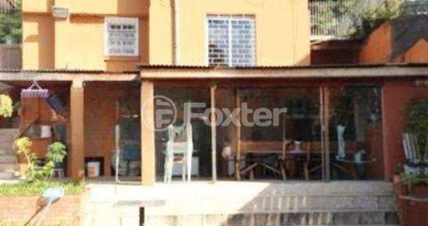 Casa com 3 quartos à venda na Rua Dom Pedrito, 432, Passo da Areia, Porto Alegre