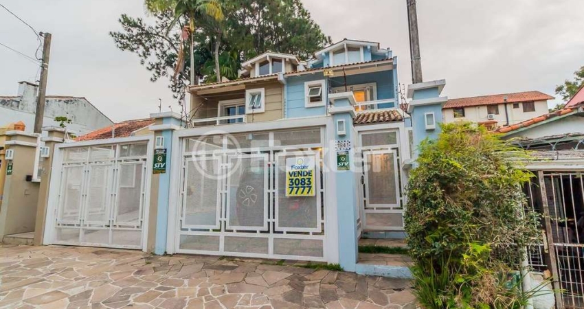 Casa com 4 quartos à venda na Rua Padre João Batista Reus, 1941, Vila Conceição, Porto Alegre
