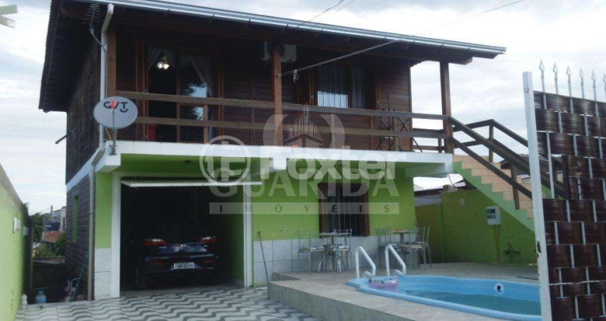 Casa com 2 quartos à venda na Rua Ênio de Souza, 39, Vila Nova, Porto Alegre