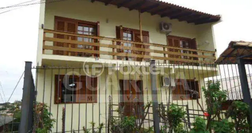 Casa com 3 quartos à venda na Avenida Natal, 241, Medianeira, Porto Alegre