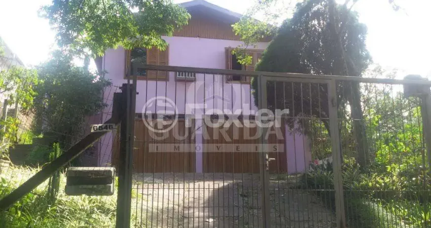 Casa com 3 quartos à venda na Avenida Professor Oscar Pereira, 6546, Cascata, Porto Alegre