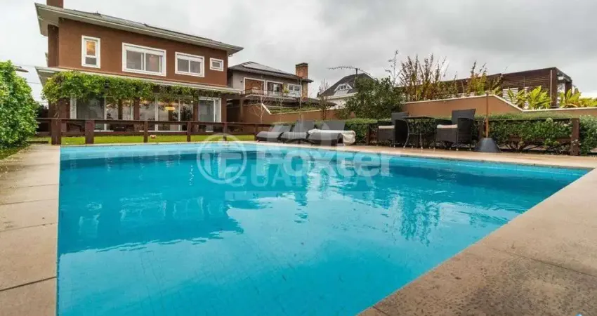 Casa em condomínio fechado com 4 quartos à venda na Avenida Juca Batista, 9000, Belém Novo, Porto Alegre