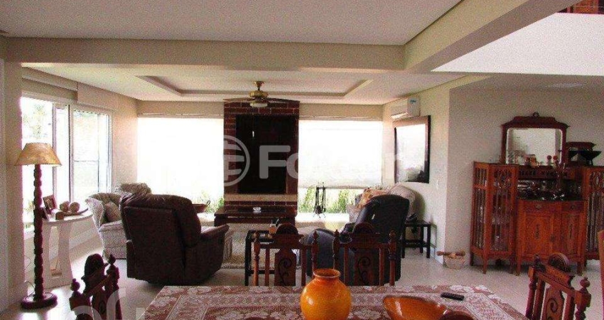 Casa em condomínio fechado com 4 quartos à venda na Avenida Juca Batista, 9000, Belém Novo, Porto Alegre