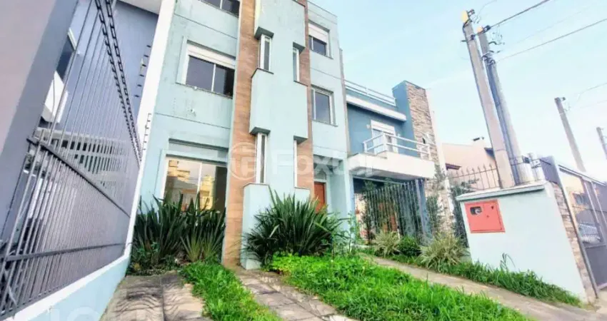 Casa com 5 quartos à venda na Rua Roberto Santini, 123, Hípica, Porto Alegre