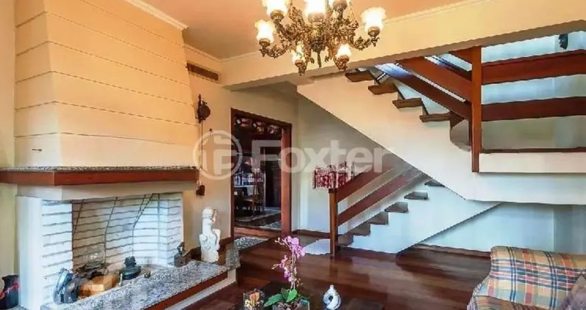 Casa com 3 quartos à venda na Rua Chico Pedro, 152, Camaquã, Porto Alegre