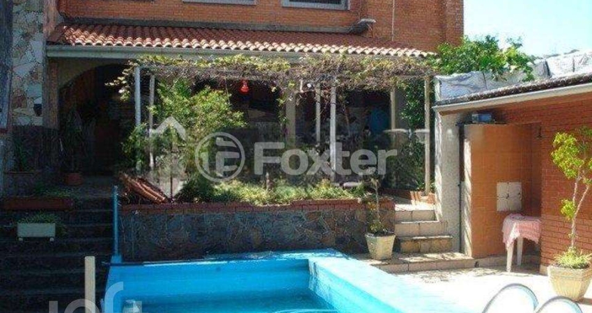 Casa com 3 quartos à venda na Rua Dona Firmina, 1660, Vila São José, Porto Alegre