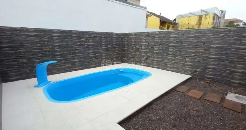Casa com 3 quartos à venda na Rua Lagoa do Peixe, 91, Sarandi, Porto Alegre